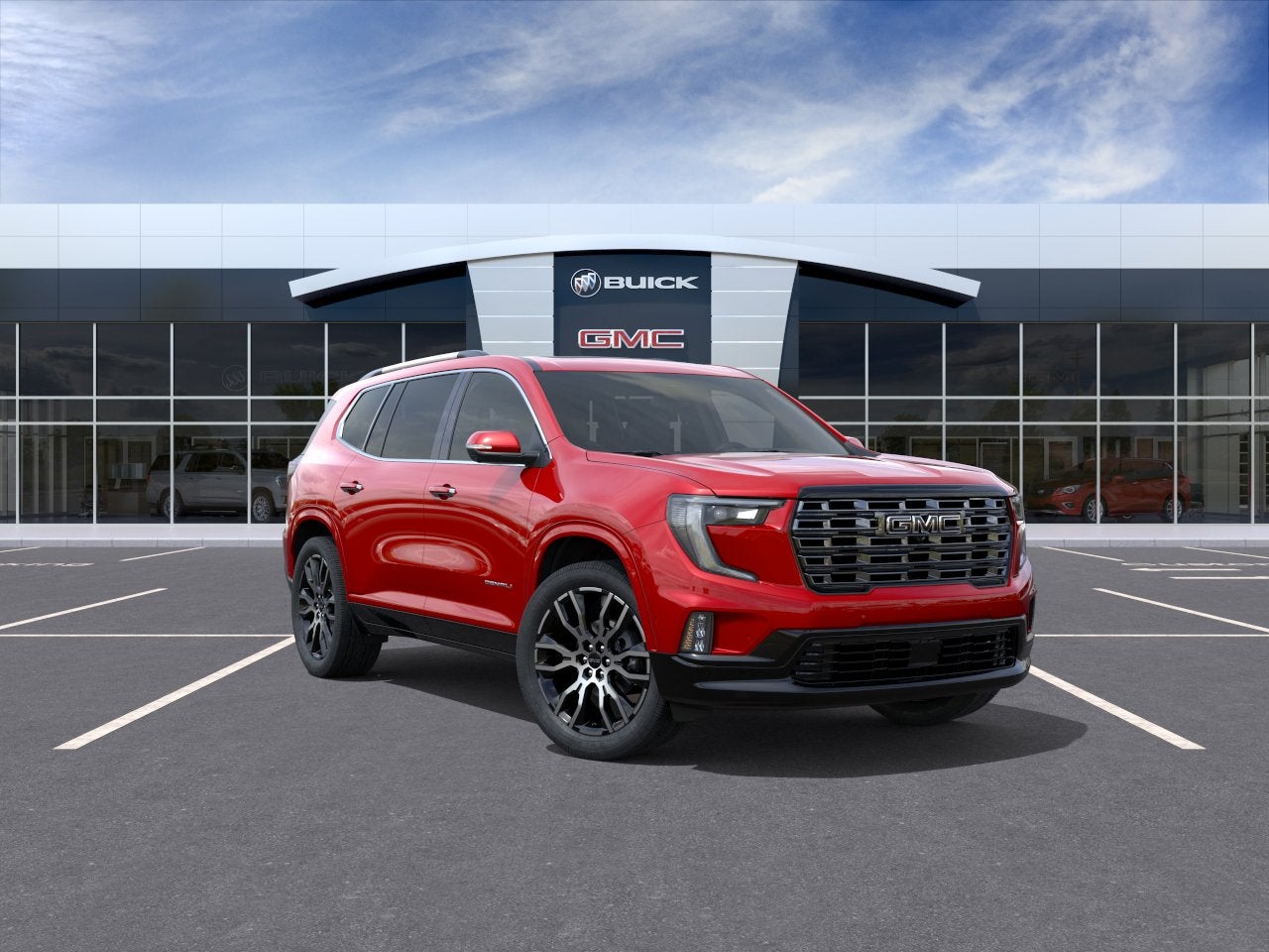 2026 GMC Acadia Denali Ultimate in Volcanic Red Tintcoat — front three-quarter view