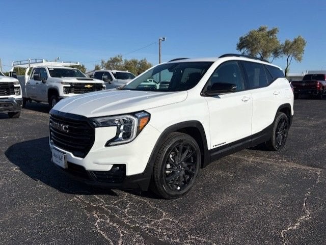 2023 GMC Terrain SLT in Summit White — front three-quarter view
